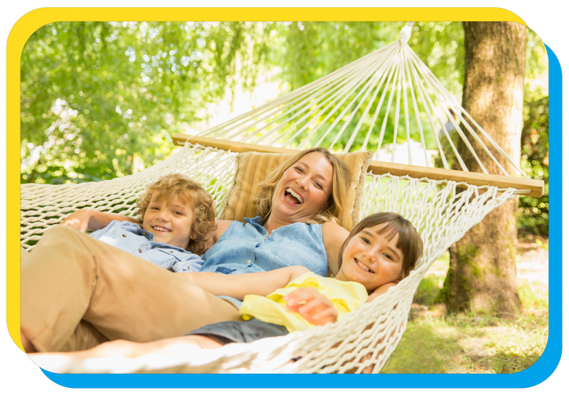 mother and children laying in hammock 